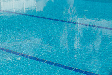 Pool background with copy space. Swimming pool during sunny day.