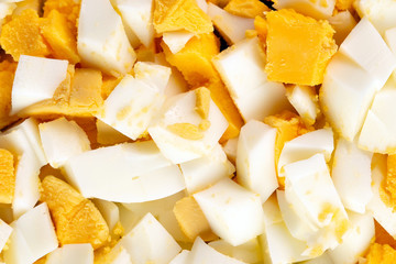 cut boiled eggs close-up background, texture