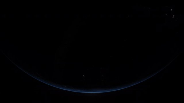 A cinematic rendering of planet Earth rise rotation moving from night side to the illuminated daylight side with the sun rising on the horizon