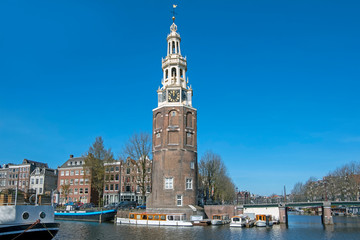 City scenic from Amsterdam in the Netherlands with the Montelbaan tower