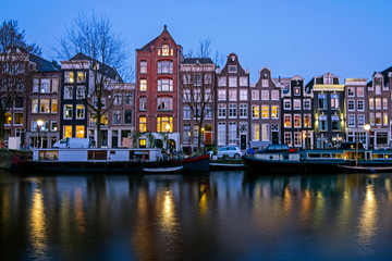 Obraz premium City scenic from Amsterdam at the Amstel in the Netherlands at sunset