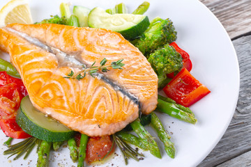 Grilled salmon steak butterfly with vegetables