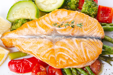 Grilled salmon steak butterfly with vegetables