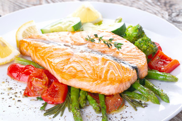 Grilled salmon steak butterfly with vegetables