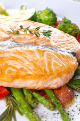 Grilled salmon steak butterfly with vegetables