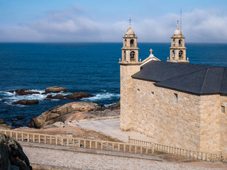 Fototapeta na wymiar Basilica Virxe da Barca/Virgen de la Barca in Muxia, Death Coast, La Coruna, Galicia, Spain