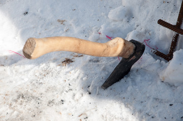 axe in the snow