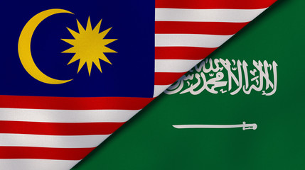 The flags of Malaysia and Saudi Arabia. News, reportage, business background. 3d illustration
