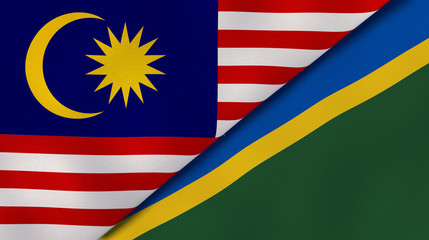 The flags of Malaysia and Solomon Islands. News, reportage, business background. 3d illustration
