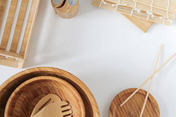 background with bamboo kitchen items on a white table top view