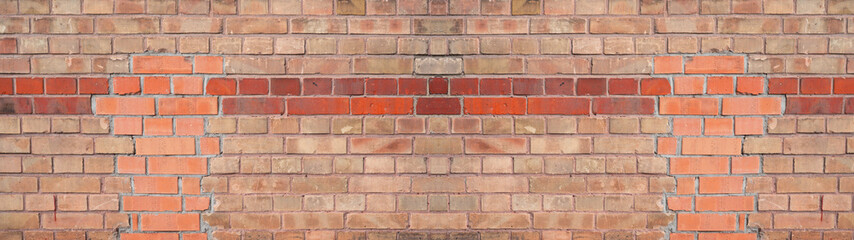 Fototapeta premium Brown orange red damaged rustic brick wall texture banner panorama 