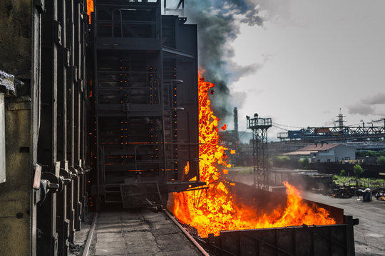 Issuing and transporting hot coke from closed-type coke oven batteries. For its further transportation and cooling. Before feeding coke to a blast furnace at a metallurgical plant.