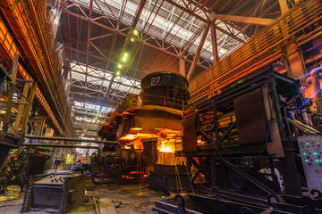 View of the continuous casting machine in an oxygen-converter shop. Steel is drained into special channels for further processing