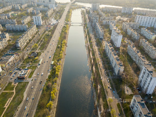 Fototapeta na wymiar Residential area Rusanovka in Kiev in the evening sunshine. Aerial drone view.