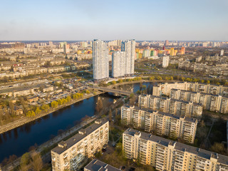 Residential area Rusanovka in Kiev in the evening sunshine. Aerial drone view.