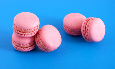macaroons on a blue background. Sweets.