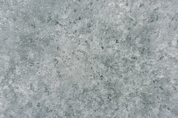 ice texture of snow. Ice surface with the original texture. frozen river, lake, winter