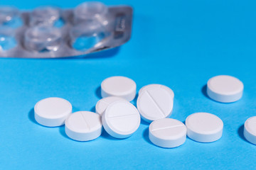 white tablets medical concept, medicine, drugs, tablets. close-up selective focus