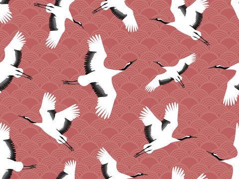 Seamless pattern with Japanese cranes. A flock of flying birds. Design for fabric, Wallpaper.