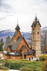KARPACZ, POLAND - MARCH 09, 2020: Old wooden temple Vang (Wang). Medieval Norwegian stave church...