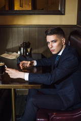 Young man in retro pub