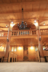 KARPACZ, POLAND - MARCH 09, 2020: Interior of the old wooden temple Vang (Wang). Medieval Norwegian...