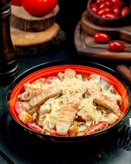 chicken caesar salad on the table