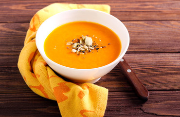Spicy soup with seeds in a bowl