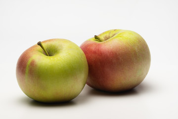 A ripe Apple shot from the side on a white background