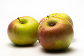 A ripe Apple shot from the side on a white background