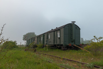 Fototapeta na wymiar Alte Eisenbahn Waggons bei Pruchten