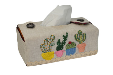 Naklejka premium Cactus pattern on handicraft tissue paper box. Homemade handcraft isolated on white background with clipping path and stacked, Design ideas concept.