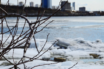 spring in the city ice on the river on a sunny day