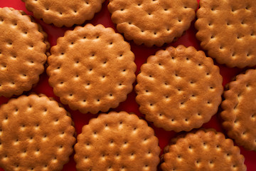 biscuits closeup on red background
