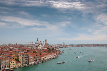 Fototapeta na wymiar Venice aerial view from Giudecca channel in a rainy day, Venice, Italy. Concept: historic Italian places, evocative and little-known views of Venice