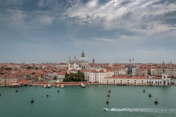 Fototapeta na wymiar Aerial view of Punta della Dogana and Salute church, Venice, Italy. Concept: historic Italian places, evocative and little-known views of Venice
