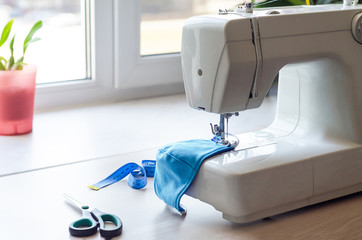 sew blue medical face mask, soft focus