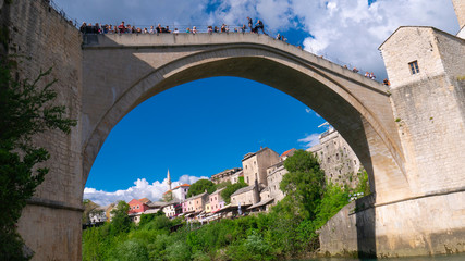 Fototapeta na wymiar Mostar, Bosnia and Herzegovina, April 2019: Old bridge and Neretva River.