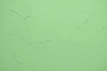 Cracked paint on the wall. Blue. Textura, destruction, paint flaking.