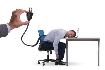 Businessman losing energy to work