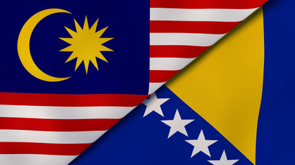 The flags of Malaysia and Bosnia and Herzegovina. News, reportage, business background. 3d illustration - obrazy, fototapety, plakaty