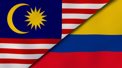 The flags of Malaysia and Colombia. News, reportage, business background. 3d illustration