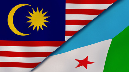 Obraz premium The flags of Malaysia and Djibouti. News, reportage, business background. 3d illustration