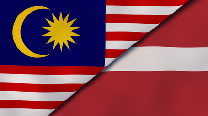 The flags of Malaysia and Latvia. News, reportage, business background. 3d illustration