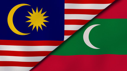 The flags of Malaysia and Maldives. News, reportage, business background. 3d illustration
