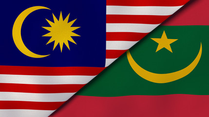 The flags of Malaysia and Mauritania. News, reportage, business background. 3d illustration