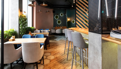 Empty restaurant interior while coronavirus pandemic, no people