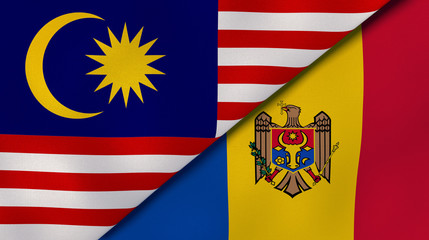 The flags of Malaysia and Moldova. News, reportage, business background. 3d illustration