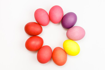 Easter multicolor eggs isolated on a white background. Rainbow. Copy space. Flat lay. Top view.