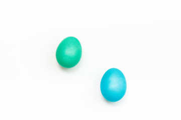 Easter multicolor eggs isolated on a white background. Rainbow. Copy space. Flat lay. Top view.